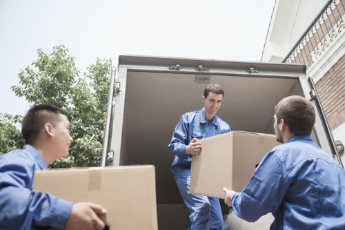 Packed boxes and furniture prepared for a local move in Chiswick