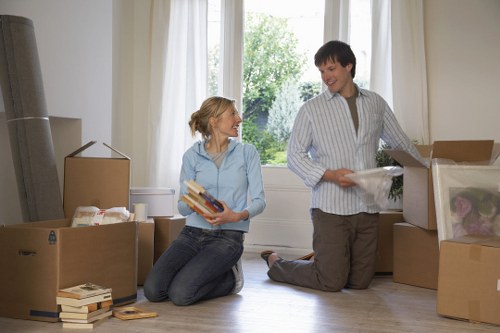 House removal service preparing boxes and furniture for a move in Chiswick
